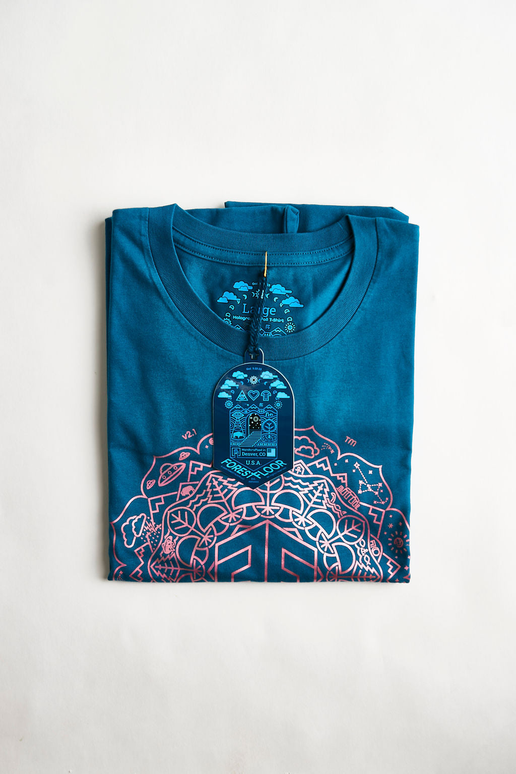 Buy Holographic / Iridescent Foil FOREST FLOOR Mandala Logo™ on 100% Cotton Premium T-Shirt