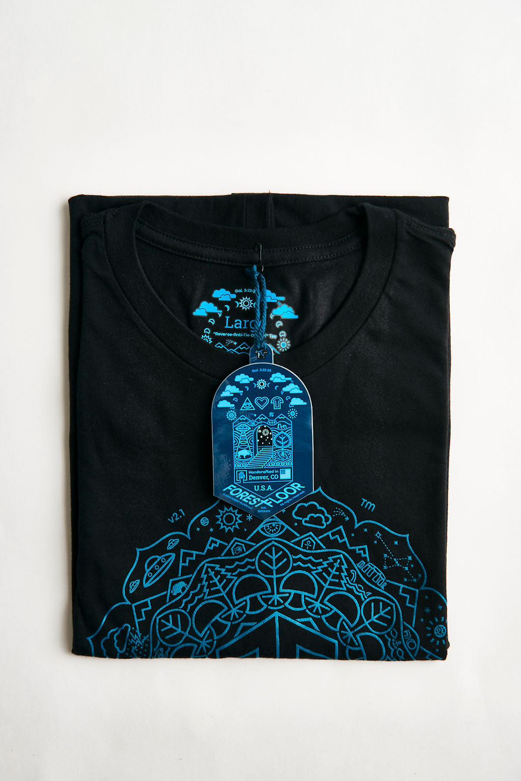 Buy "Reverse-Anti-Tie-Dye-Tri Tee" Psilocybin Blue™ FOREST FLOOR Mandala Logo™ on Triblend T-Shirt