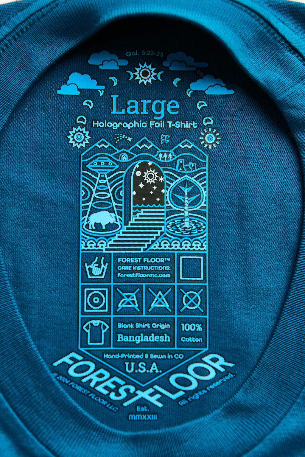 Holographic / Iridescent Foil FOREST FLOOR Mandala Logo™ on 100% Cotton Premium T-Shirt