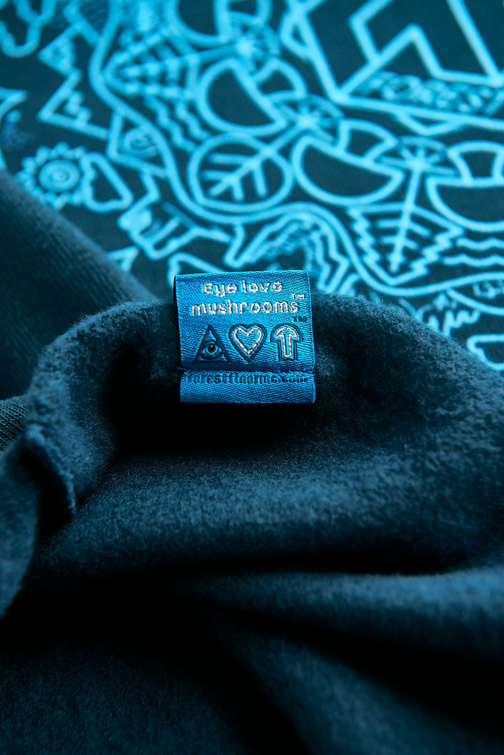 Women's Psilocybin Blue™ Glow-in-the-Dark FOREST FLOOR Mandala Logo™ on Cropped Sponge Fleece Hooded Sweatshirt